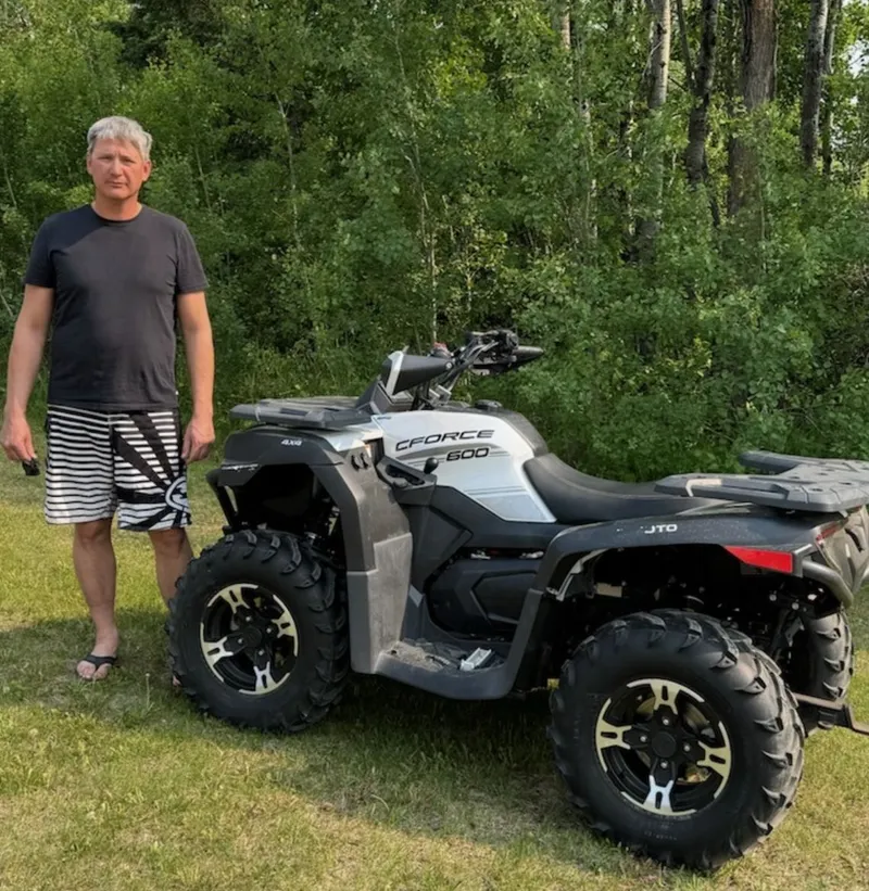 Mike with their ATV