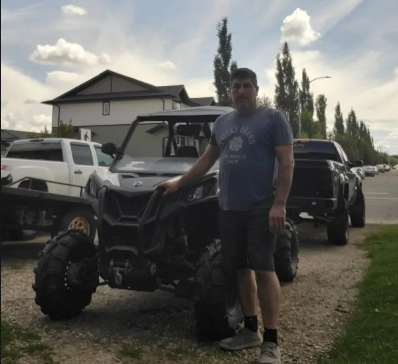 Jason with their Side-by-Side